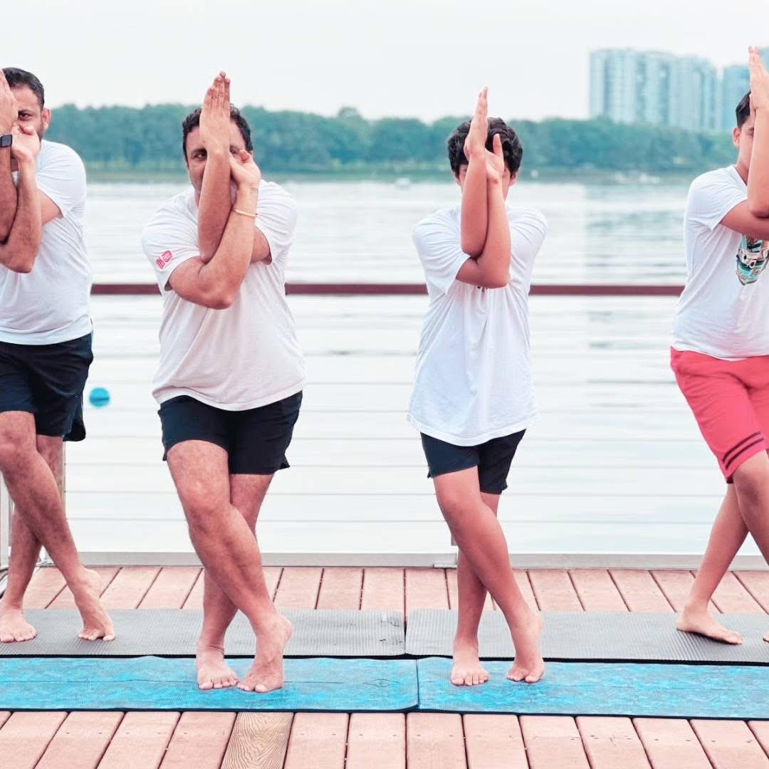 Eagle pose practice on the boardwalk