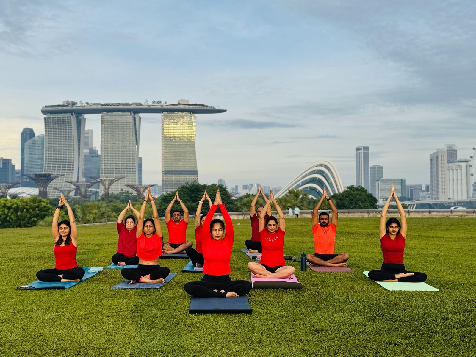 Class at Marina Barrage with the city skyline